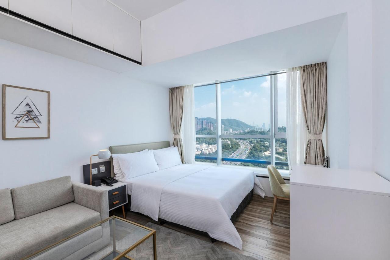 Golden Central Hotel Serviced Residence-Xin Hao E Du Shenzhen Bagian luar foto