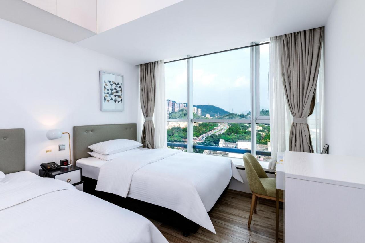 Golden Central Hotel Serviced Residence-Xin Hao E Du Shenzhen Bagian luar foto