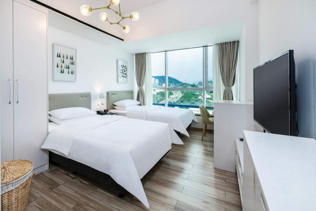 Golden Central Hotel Serviced Residence-Xin Hao E Du Shenzhen Bagian luar foto
